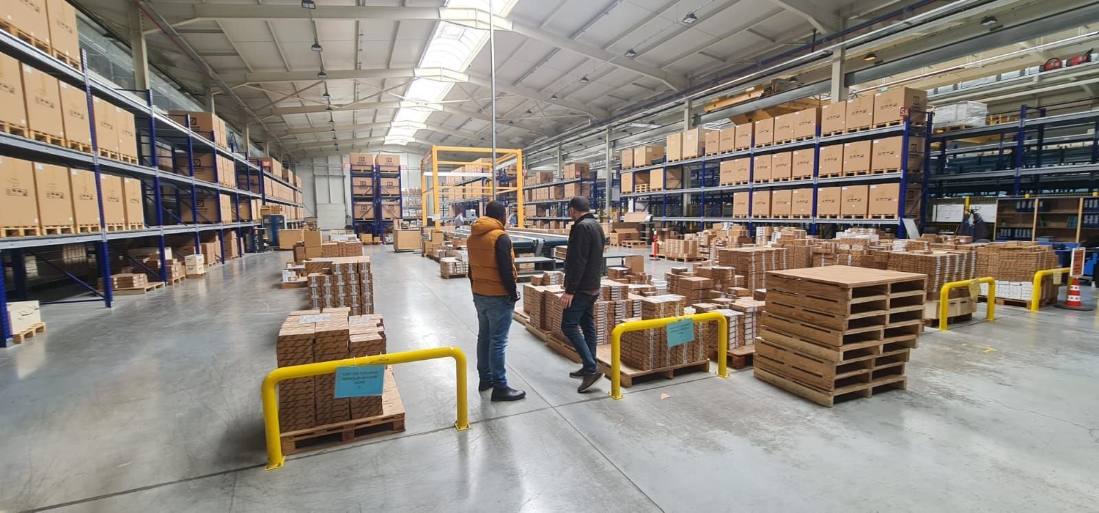 TED team members inspecting palletised orders in a supplier warehouse